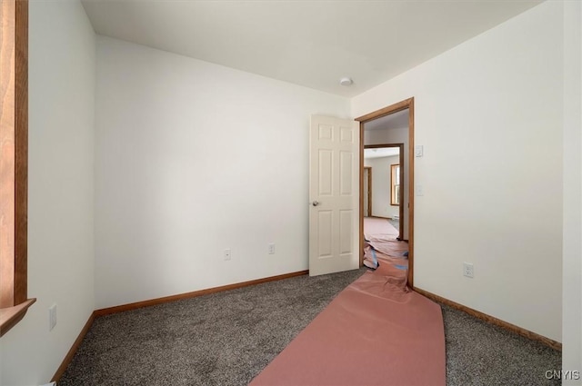 spare room featuring carpet