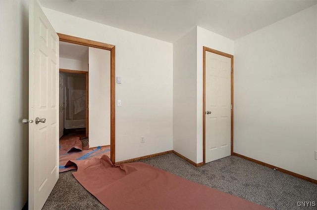 empty room featuring carpet floors