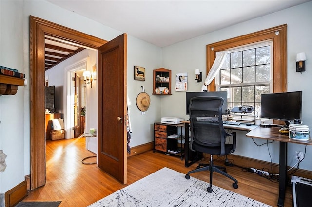 office space featuring light wood-type flooring