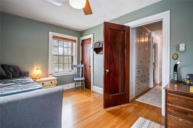 bedroom featuring ceiling fan and hardwood / wood-style floors