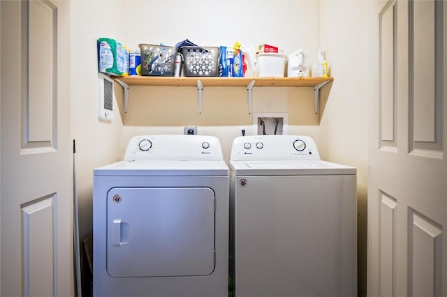 laundry area featuring washing machine and dryer