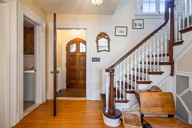 entryway with light hardwood / wood-style flooring