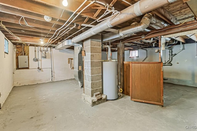 basement featuring gas water heater and electric panel