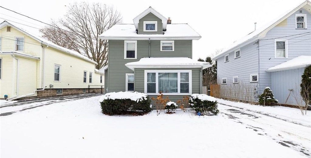 view of snow covered property