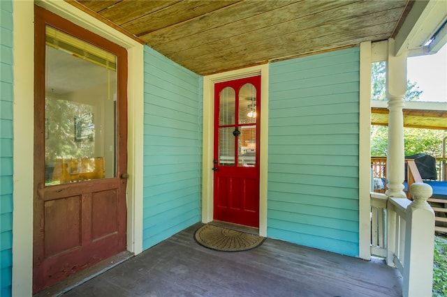 entrance to property with a porch