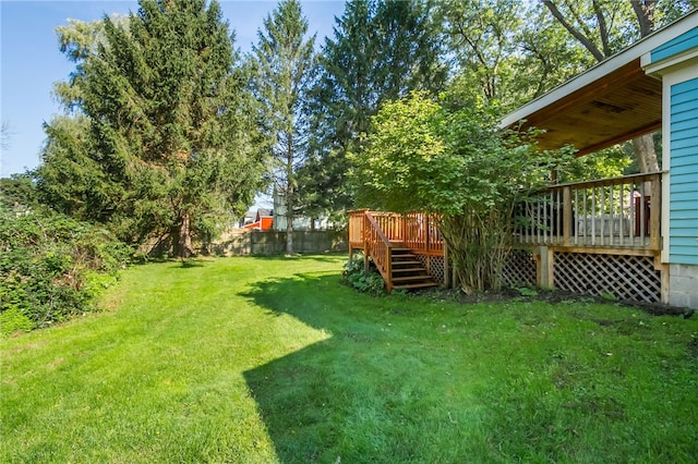 view of yard featuring a wooden deck