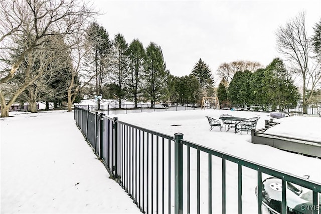 view of yard layered in snow