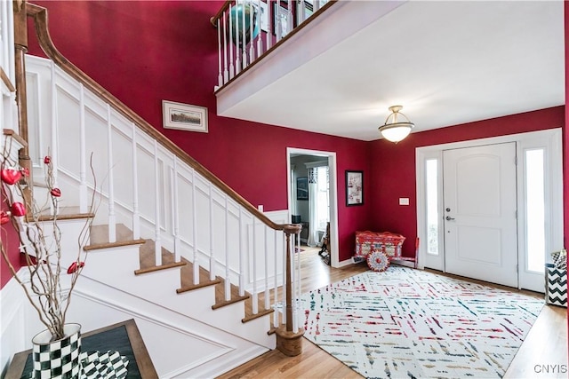 entryway with light hardwood / wood-style floors