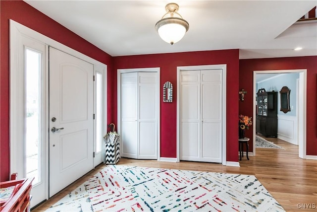 foyer entrance featuring light hardwood / wood-style flooring