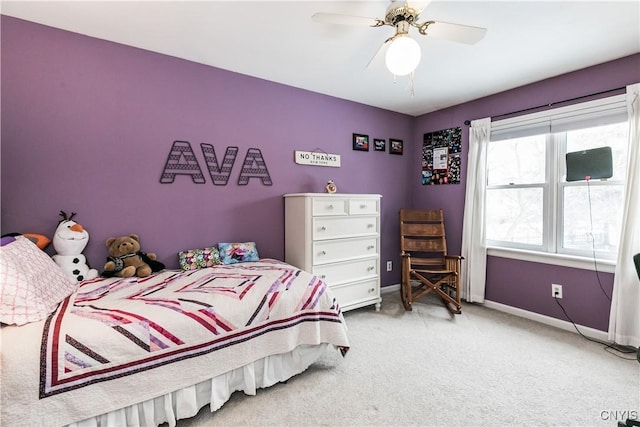 bedroom with ceiling fan and carpet floors