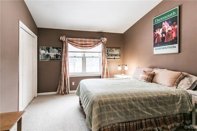 carpeted bedroom with a closet