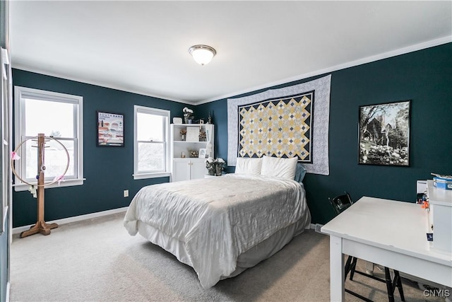 bedroom with ornamental molding and carpet