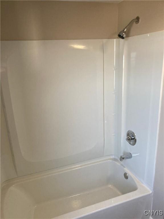 bathroom featuring shower / washtub combination