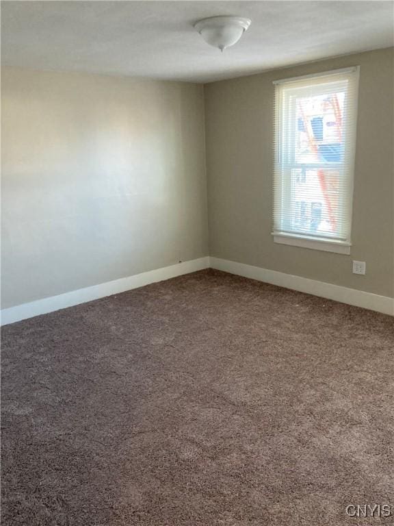 spare room with carpet flooring