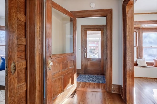 doorway to outside featuring light hardwood / wood-style flooring