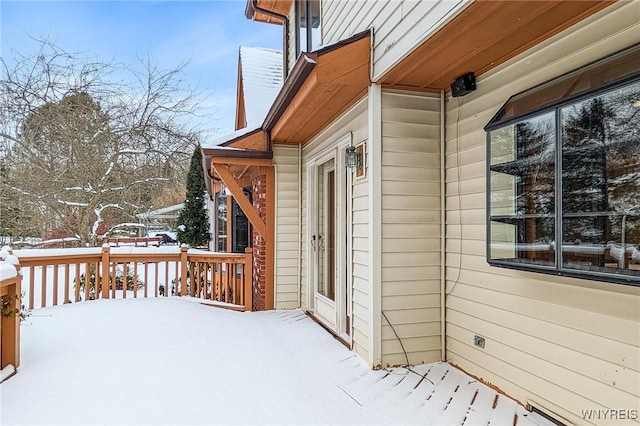 view of snow covered deck