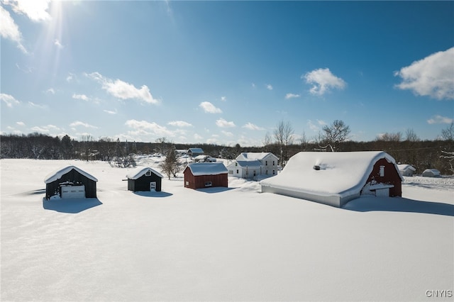 view of yard layered in snow