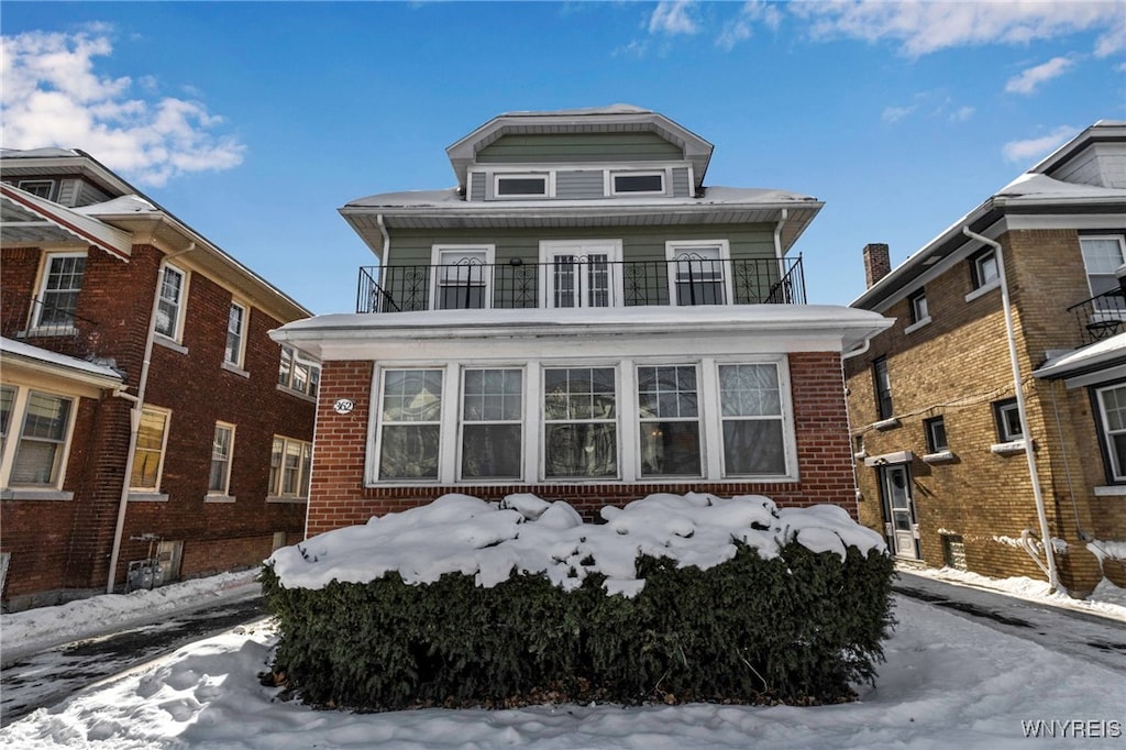 view of property featuring a balcony