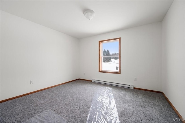 unfurnished room with baseboard heating and carpet flooring