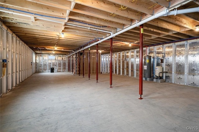 basement featuring water heater