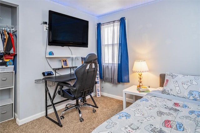 carpeted bedroom featuring a closet