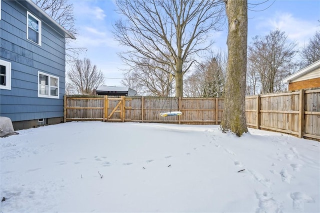 view of yard covered in snow