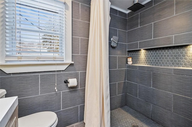 bathroom with walk in shower, toilet, and crown molding