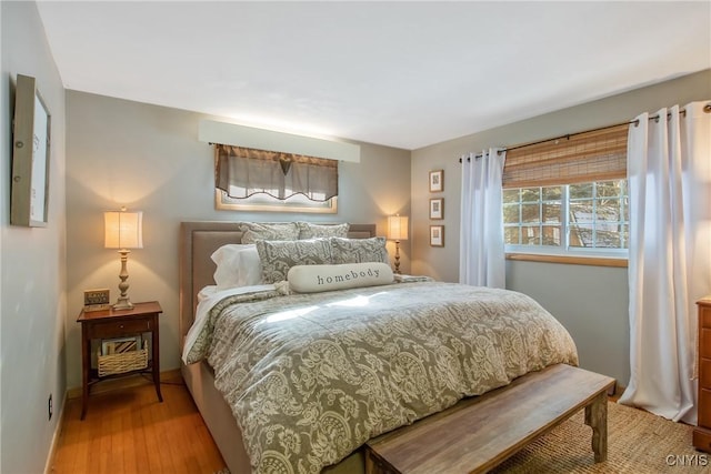 bedroom featuring hardwood / wood-style floors