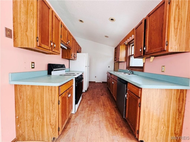 kitchen featuring brown cabinetry, electric range, light countertops, and stainless steel dishwasher