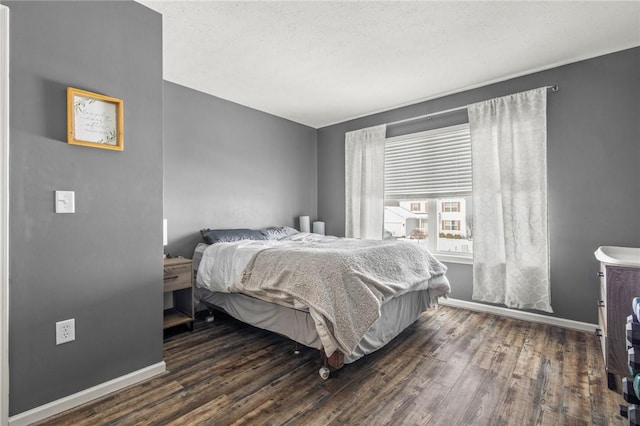 bedroom featuring dark wood-type flooring