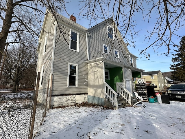 view of snow covered property