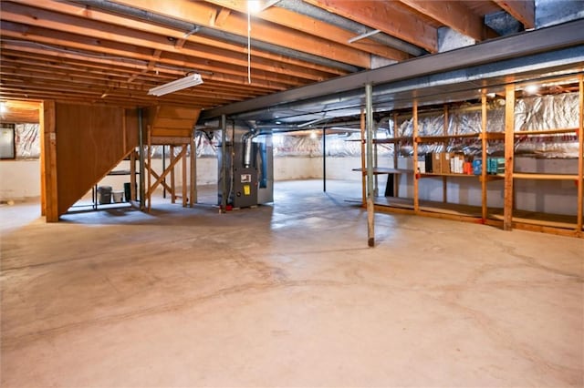 basement featuring heating unit