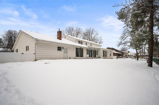 view of snow covered property