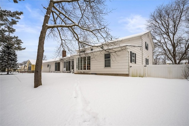 view of snow covered property