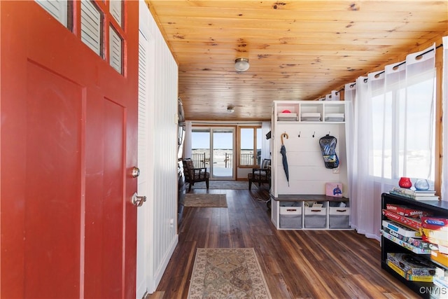 mudroom featuring dark wood-type flooring, vaulted ceiling, and wooden ceiling