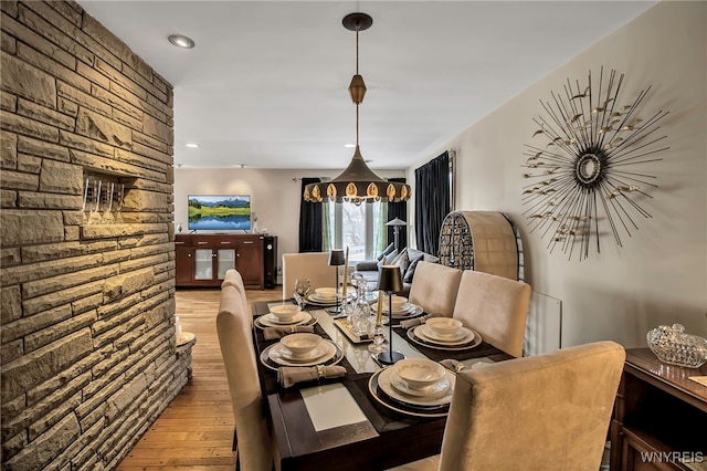 dining space with light wood-type flooring