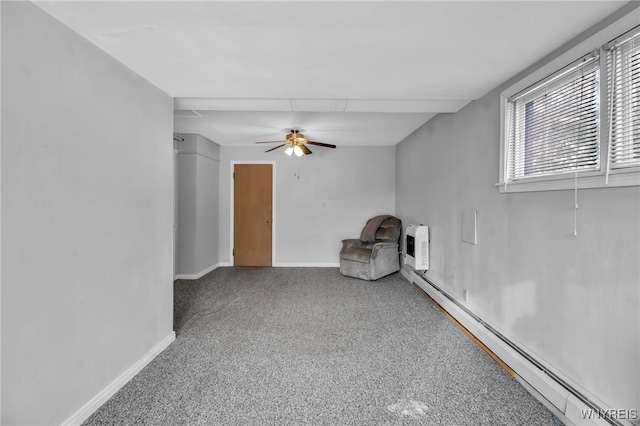 unfurnished room with ceiling fan, a baseboard radiator, and carpet floors