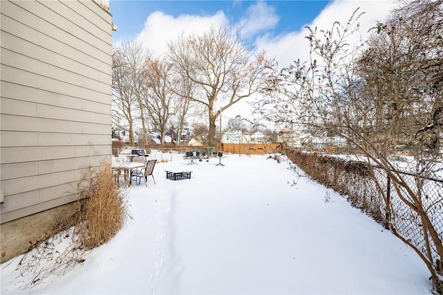 view of snowy yard