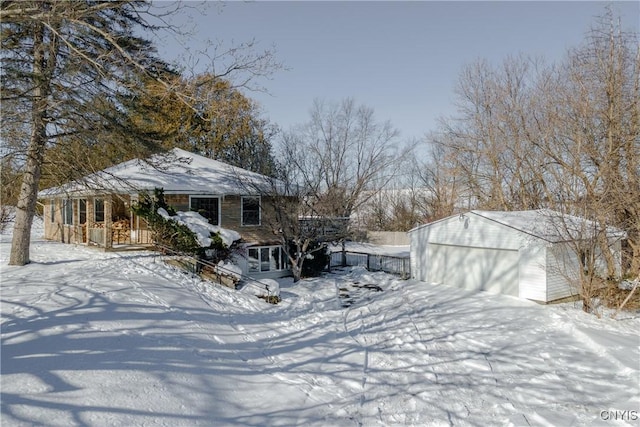 view of front of property with an outbuilding and a garage