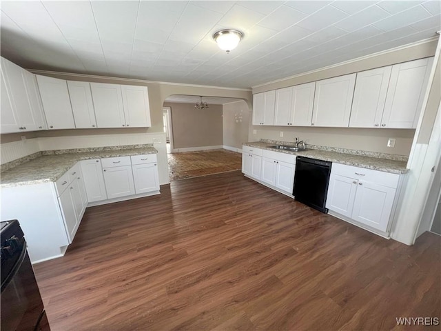 kitchen featuring sink, dishwasher, stove, dark hardwood / wood-style floors, and white cabinets