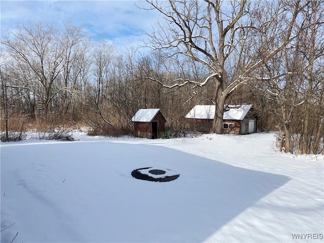 view of yard covered in snow