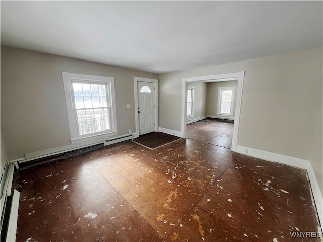 foyer featuring a baseboard heating unit