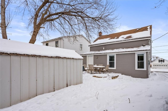 view of snow covered property