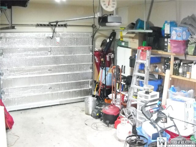 garage featuring a garage door opener