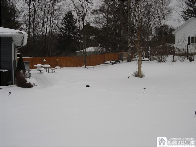 view of snowy yard