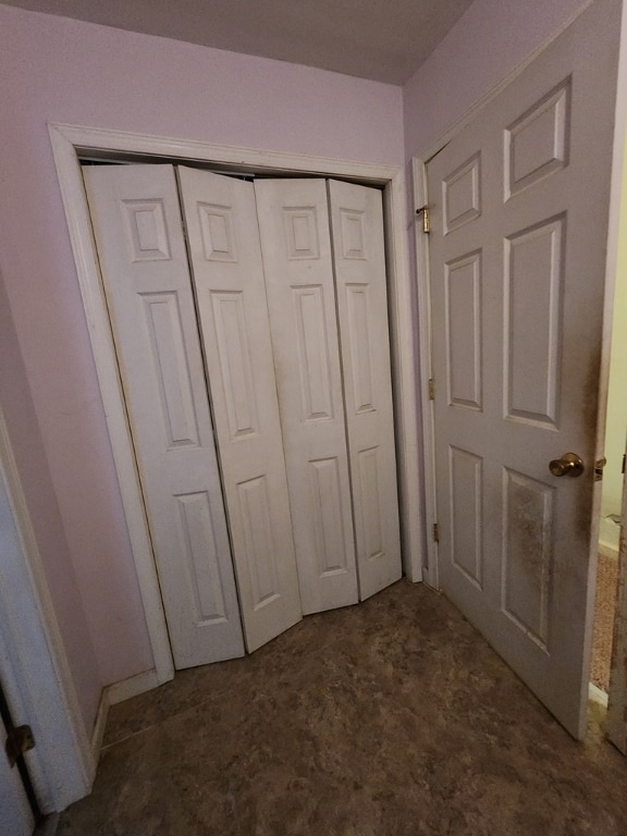 unfurnished bedroom featuring a closet