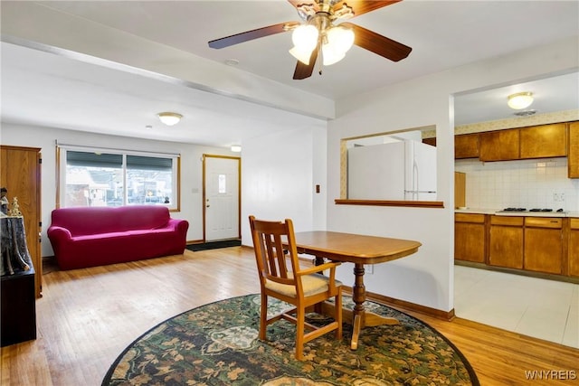 dining room featuring light wood-type flooring