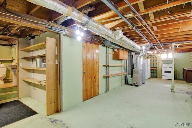 basement featuring heating unit