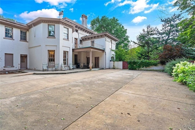 back of house featuring a patio area