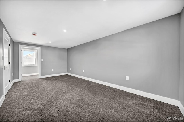 empty room featuring carpet flooring